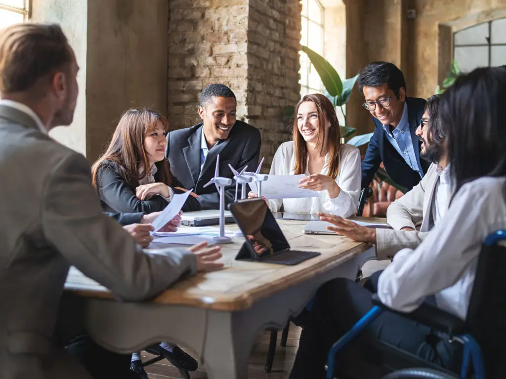 A diverse workgroup in a conference room working together